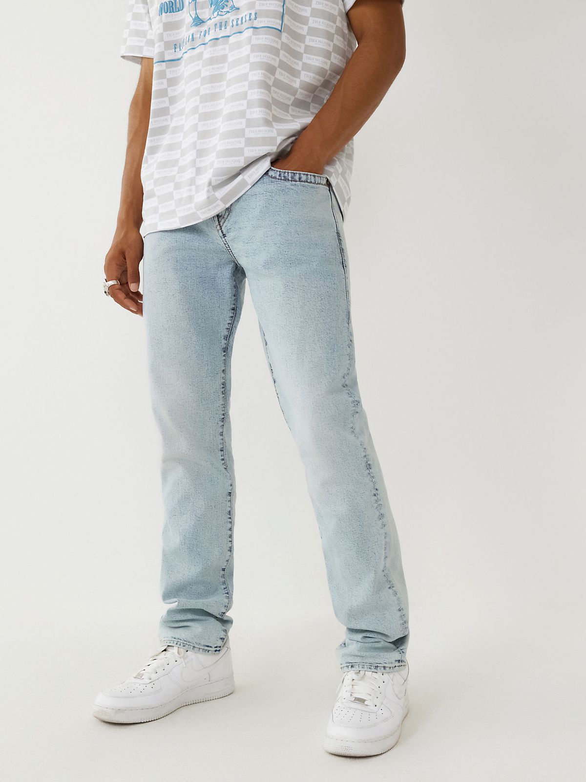 TRUE RELIGION ONLINE EXCLUSIVE GENO FITTED JEANS WITH FLAPS