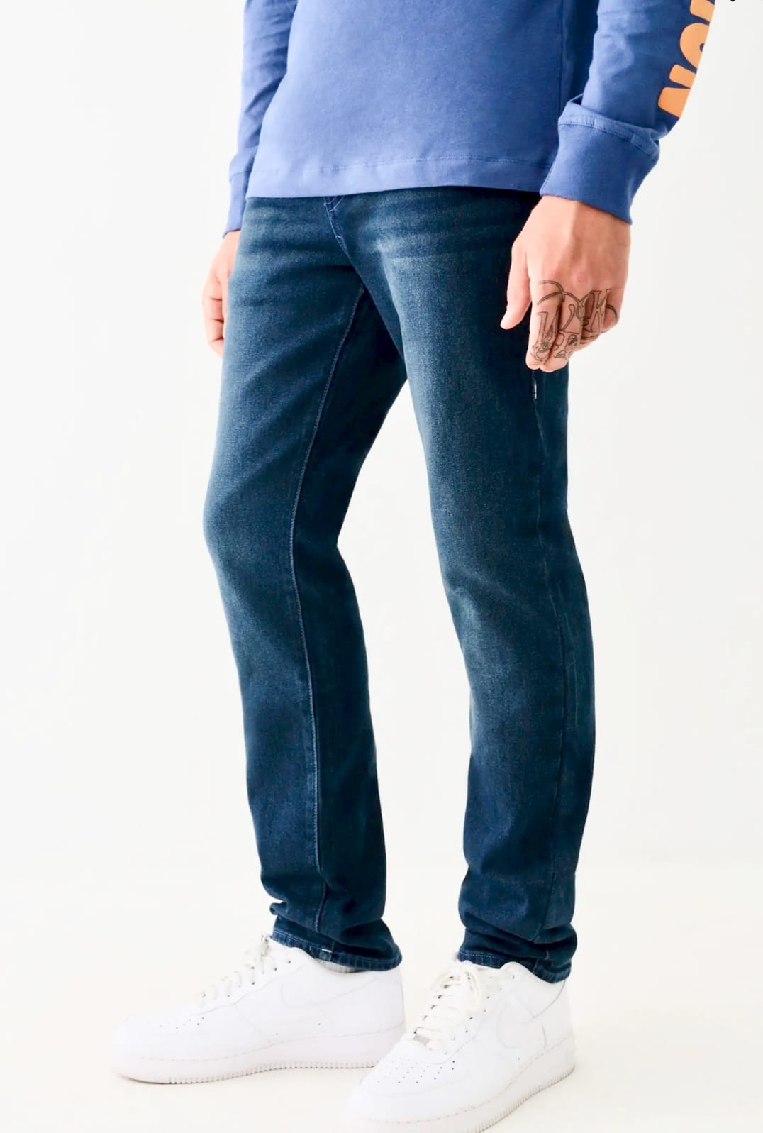 TRUE RELIGION GENO SINGLE-SEAM SKINNY JEANS WITH FLAPS