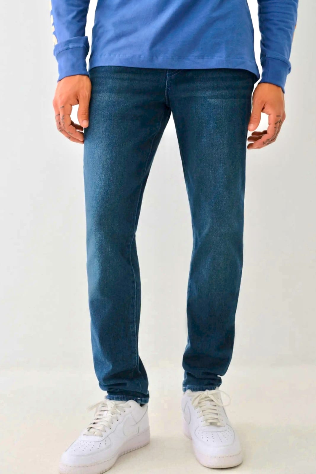 TRUE RELIGION GENO SINGLE-SEAM SKINNY JEANS WITH FLAPS