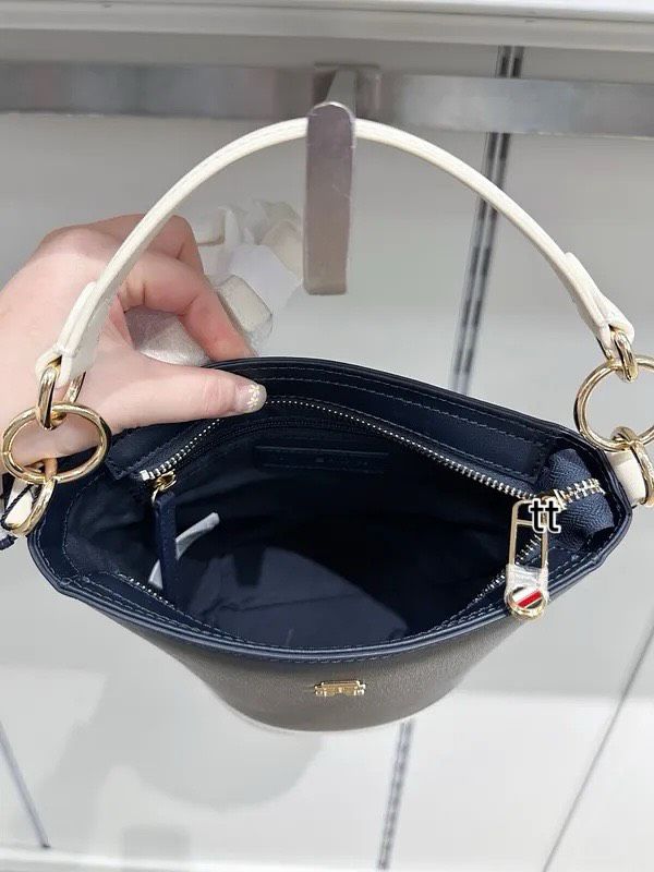 Elevate your everyday style with the Tommy Hilfiger Navy & White Bucket Bag