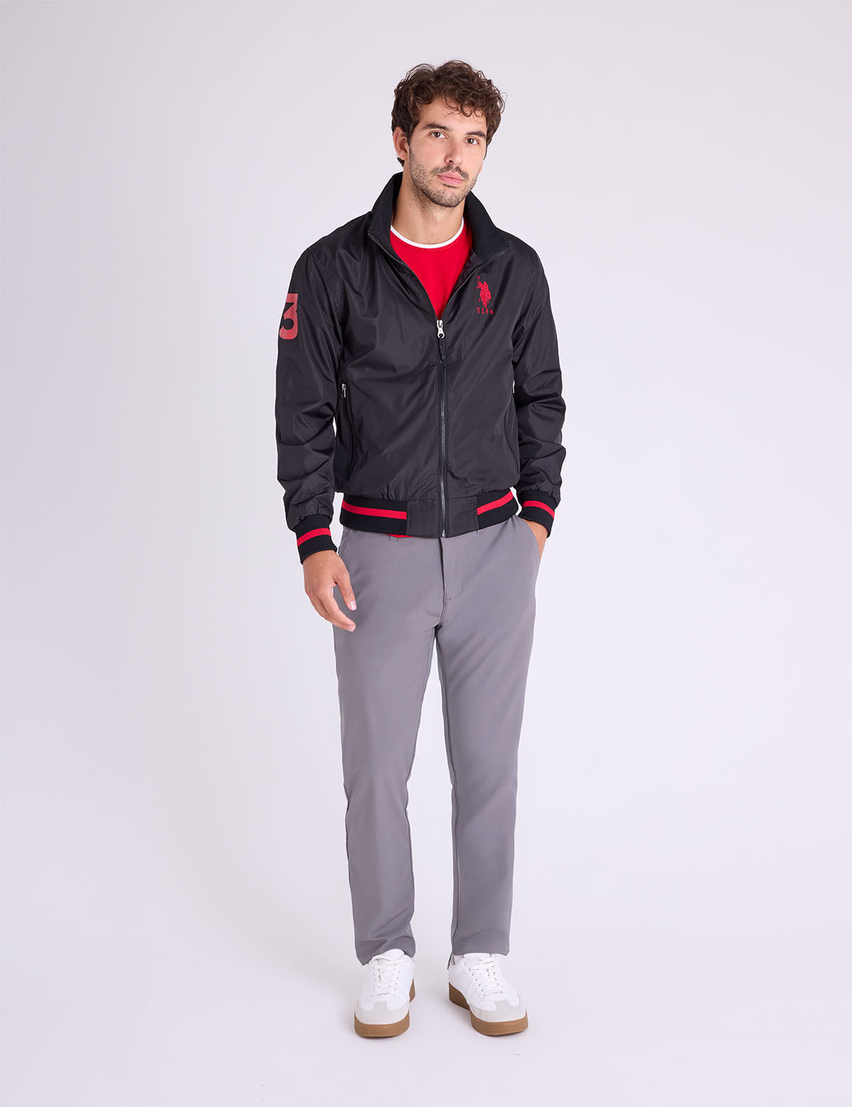 US. Polo Assn. Men’s Black Bomber Jacket with Red Accents - HIPPO US Brands US. POLO ASSN