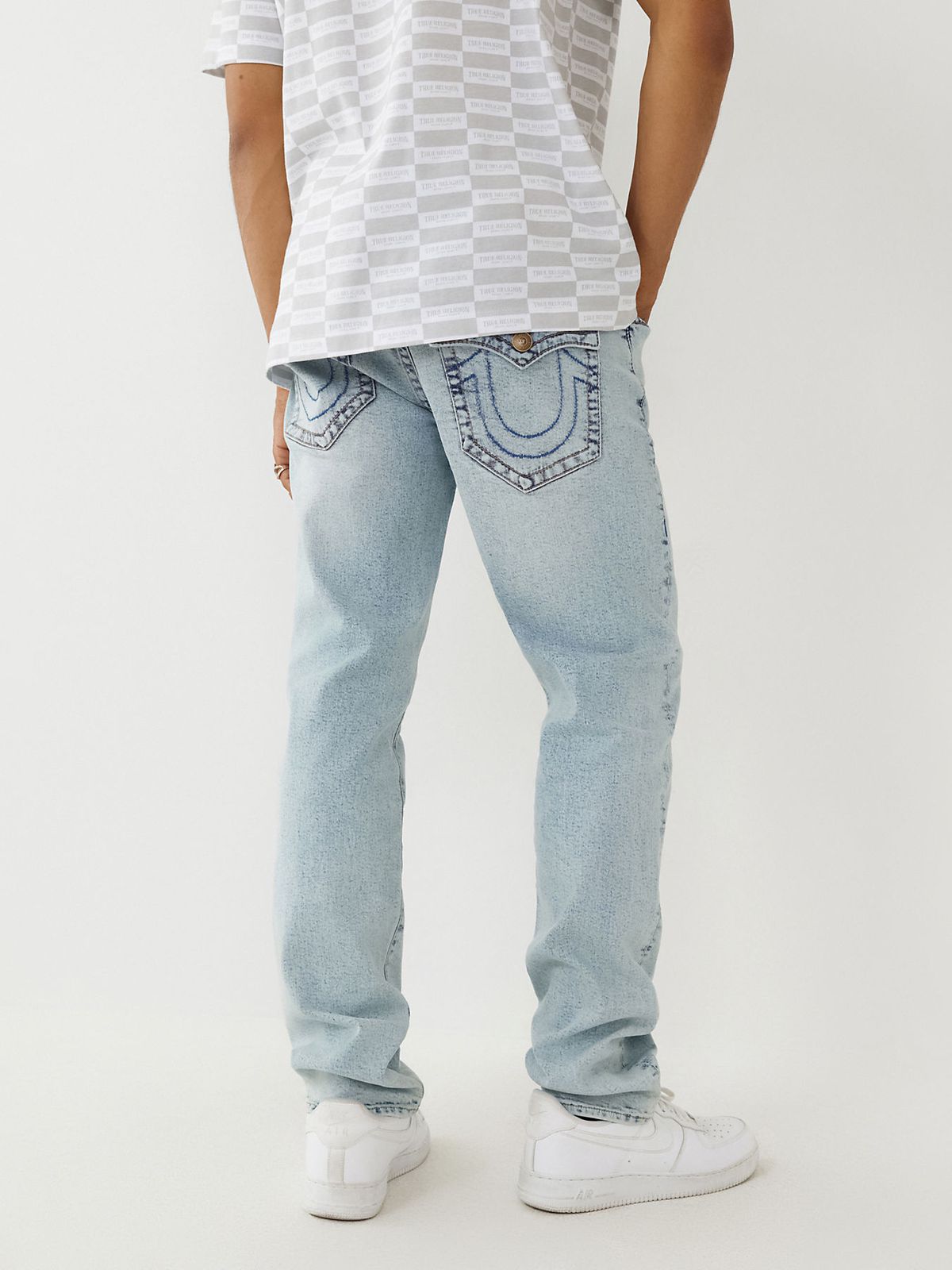 TRUE RELIGION ONLINE EXCLUSIVE GENO FITTED JEANS WITH FLAPS